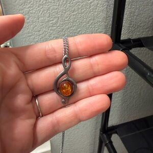 Silver Treble Clef Necklace with Amber Accent